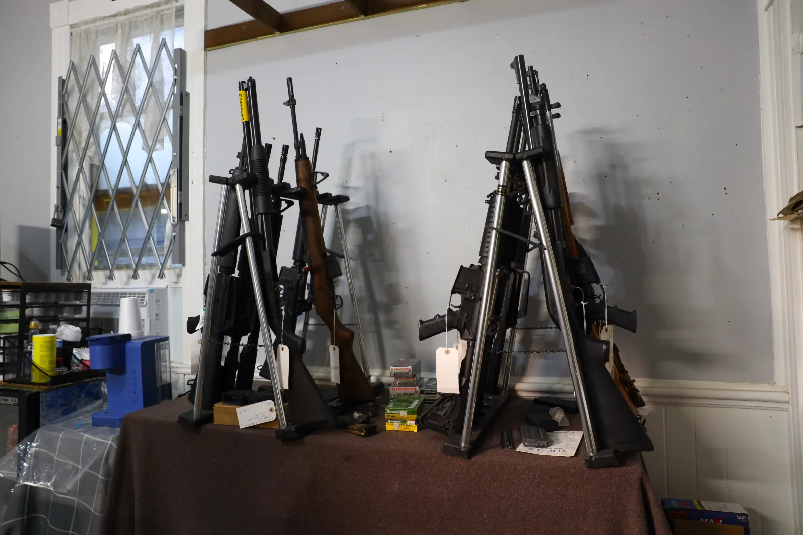 Modern sporting rifles on display stands